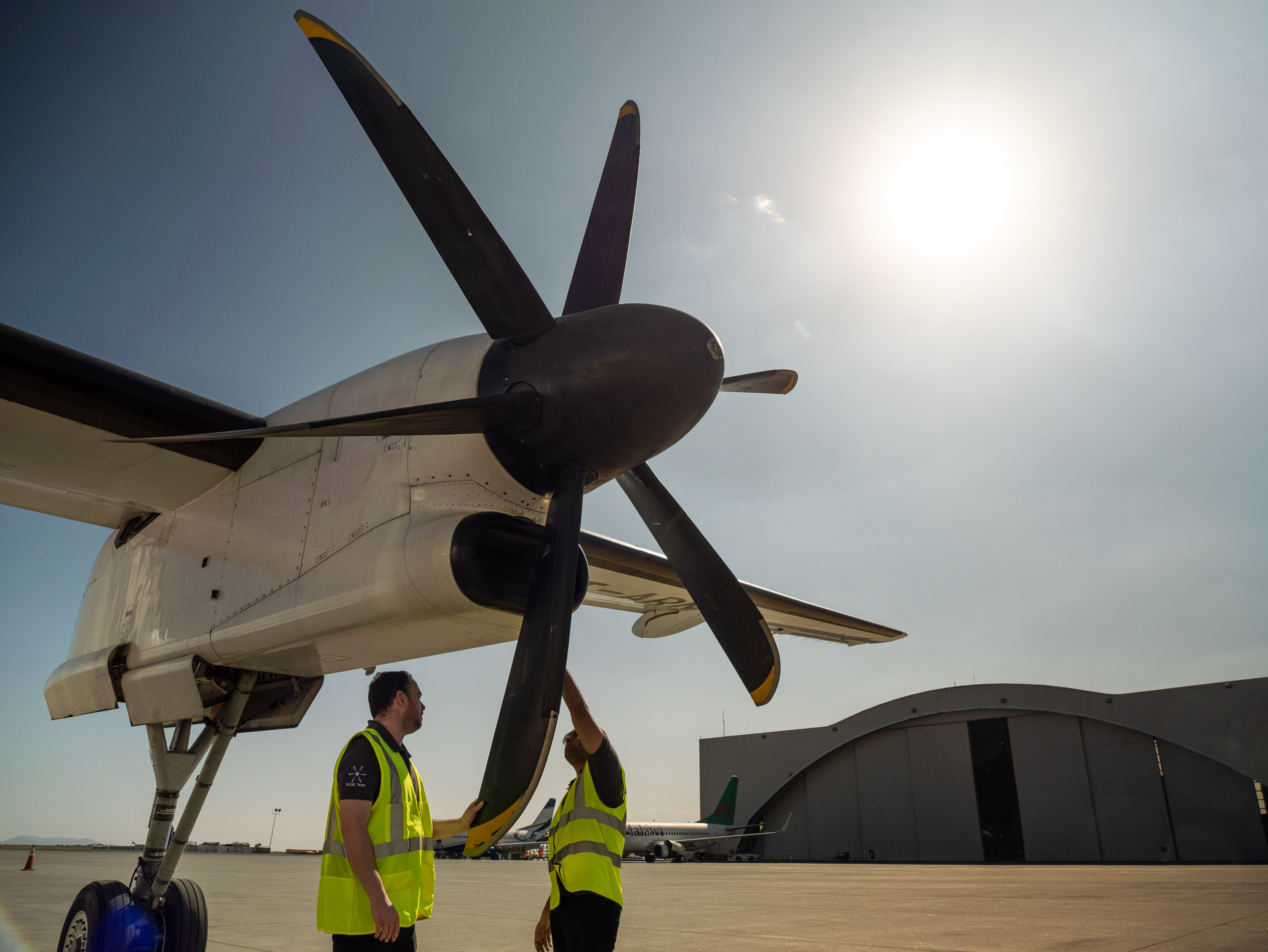 Dowty employees inspecting a Dash 8 propeller blade